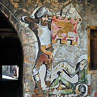 Muurschilderingen op huizen te Cibiana di Cadore, Dolomieten, Italië
