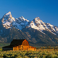 Mormon Row barn with brook, Grand Teton NP, Wyoming, US